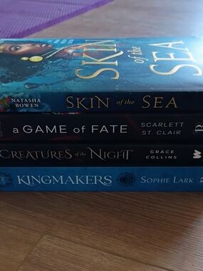 Stack of YA Fantasy Paperbacks - Blue & Black Covers